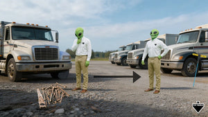 alien standing in front of one truck then standing in front of multiple trucks