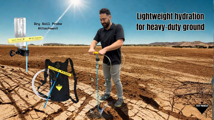 Worker using a dry soil probe attachment to soften compacted ground during probing